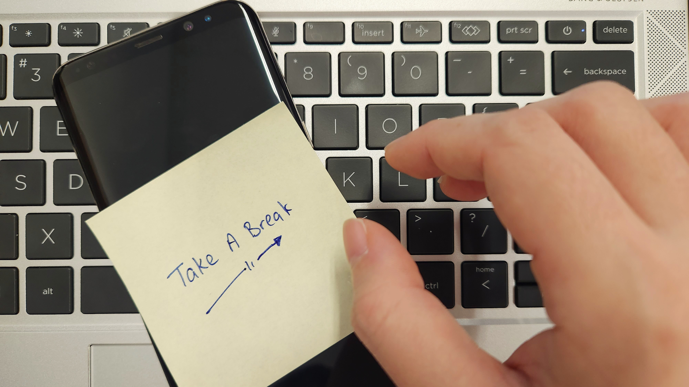 Take a break, digital detox, laptop, mobile phone, post it with writing on it - take a break